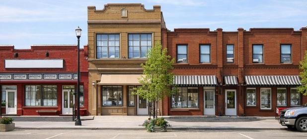 An AI-generated image of Olney’s Main Street, based on sketches commissioned by the Olney Economic Development Corp from Grossman Design Build. The rehabilitation plan for downtown and an ambitious housing plan will start in 2026, thanks to the Olney Ci