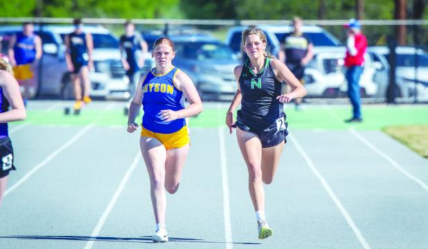 NHS Ladycat Lexi Gowens kept pace with other runners in the 100m but fell just shy of the podium. Photo by Will Sadler