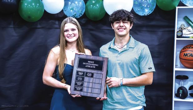 The top honor for NHS athletes was the most outstanding athlete chosen by coaches for one Ladycat and one Bobcat. This year’s recipients where Camren Mallory [L] and Rylan Hinojosa [R]. ` Photo by Will Sadler