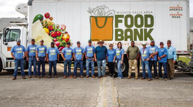 The Ministry of Helps had an army of volunteers to help with this month’s grocery delivery. Photo by Will Sadler