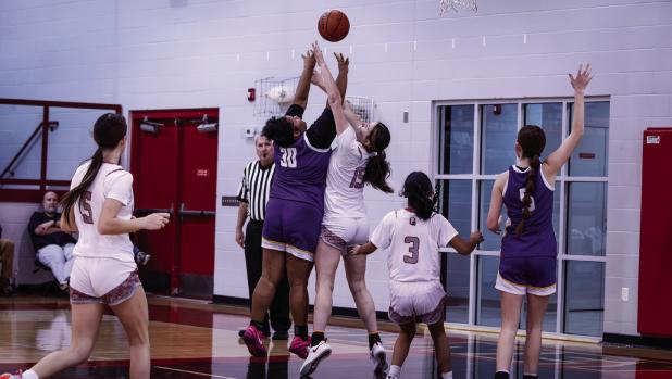 OHS Lady Cubs #15-Kaiten Hughes is gaining momentum after joining the Varsity team and had a great defensive game against the Lady Buckaroos. Look for Hughes to dominate under the net as the season progresses and she gains more confidence. Photo by Will S