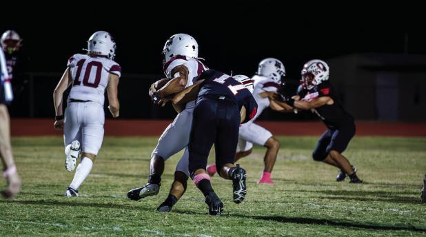 Cub #17 Alex Solano LB-RB comes back to the team ready to fight and put on a defensive show against the Bearcats, powering through the line shooting at the QB and making tackles for loss on plays. Photo by Will Sadler