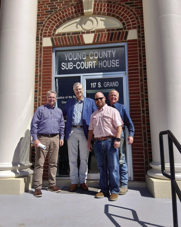 Young County officials look over the doors at the county sub-courthouse as they prepare a grant application to upgrade security at the facility. Pictured from left are OEDC Executive Director Tom Parker, County Judge Win Graham, Justice of the Peace Joey