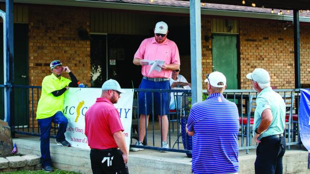 ORA President Landon Rowe goes over rules and hole order before tee off. Photo by Will Sadler