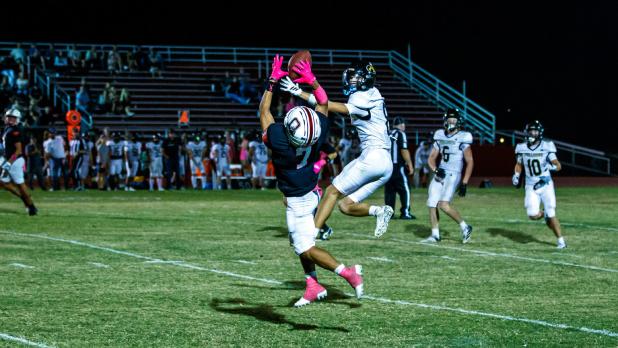OHS Cub #7 Damian Hernandez with a touchdown reception and the only score for the Cubs for the night, but it was called back with an offensive pass interference penalty. Videos and photos disputed the call, but you win some, you lose some. Photo by Will S