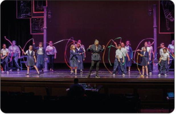 Graham Regional Theater’s summer play of Matilda had many group dance and singing numbers performed by the large ensemble of performers. Photo by Will Sadler
