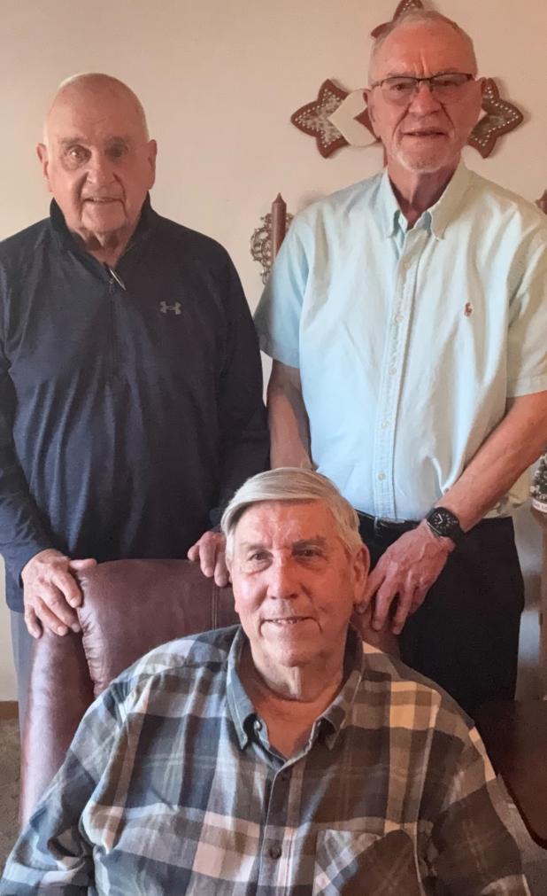 The tri-captains from the 1959 Olney Cubs football team recently got together in San Angelo at the home of Harold Philipp (seated). Ken Sheppard (standing on the right) and Jim Lovett reminisced about that 1959 season where the Cubs went undefeated until