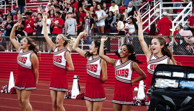 The OHS Cheerleaders kept the Cub fans in the game with spirit filled cheers, dance routines and stunts. Photo by Will Sadler