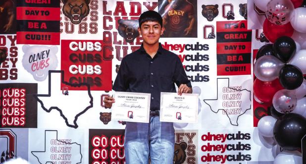 OHS Cub Adrian Gonzalez was presented with the Team MVP of the Year for Cross Country. Photo by Will Sadler
