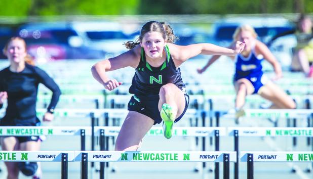 NHS Ladycat Camren Mallory was a dominant force in hurdles.