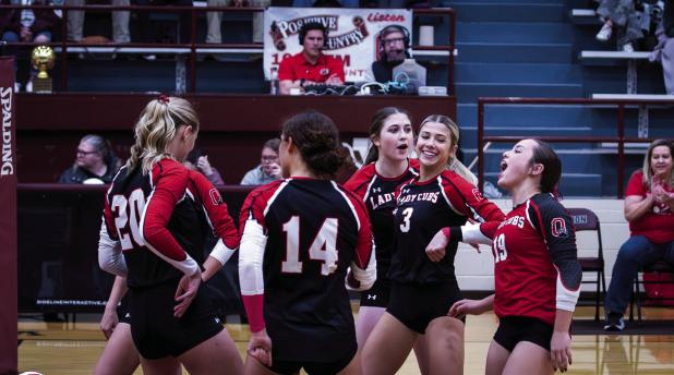 The OHS Lady Cubs celebrate during game one against the Lady Panthers, the team had some great success during game one but ultimately fell in 3 during the series. Photo by Will Sadler