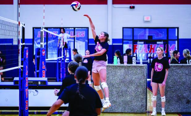A Ladycat sends a kill shot rocketing towards defenders. Photo by Will Sadler