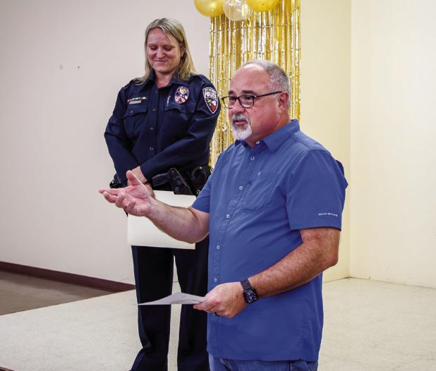 Outgoing Olney Police Chief Dan Birbeck gives a farewell speech during his going away luncheon at the Olney Civic Center on June 20. Chief Birbeck took up his new post as Vernon’s police chief on Monday. You will be missed, Chief Birbeck! Photo by Will