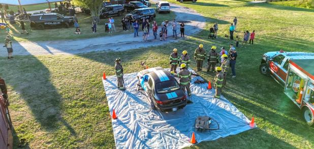 The Olney Volunteer Fire Department put on a demonstration of how the team rescues trapped victims of wrecks using tools that can pry open stuck doors and cut metal. Photo by Will Sadler
