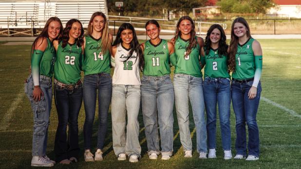 The Newcastle Ladycats Varsity basketball team is announced and greets the crowd during the Newcastle Booster Clubs Booster Bash. Photo by Will Sadler