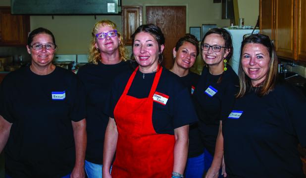 The H.O.M.E. gala meal featured brisket and sausage smoked by director Preston Crow and served by residents and former residents of the program. Photo by Will Sadler