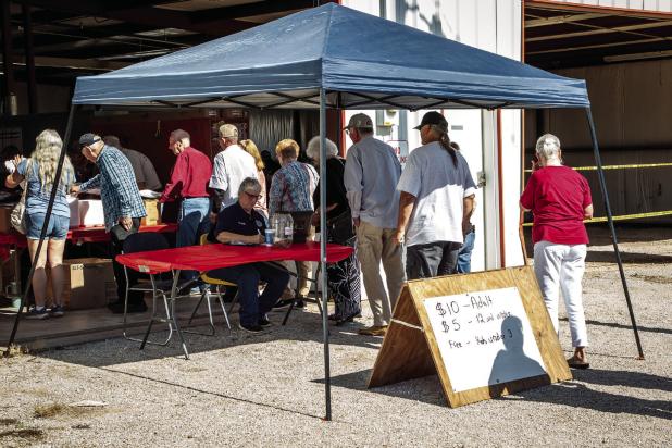 The annual Newcastle Volunteer Fire Departments Fish Fry and Auction had community members lining up in droves for a delicious catfish dinner and a chance to outbid neighbors for some great items in the silent auction. Photo by Will Sadler