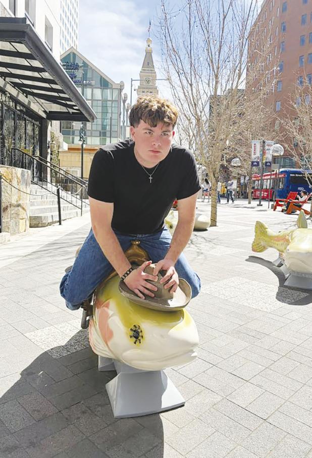 Ben Norris Riding a trout at Union Station in Denver, Colorado. Photo provided by Ben Norris