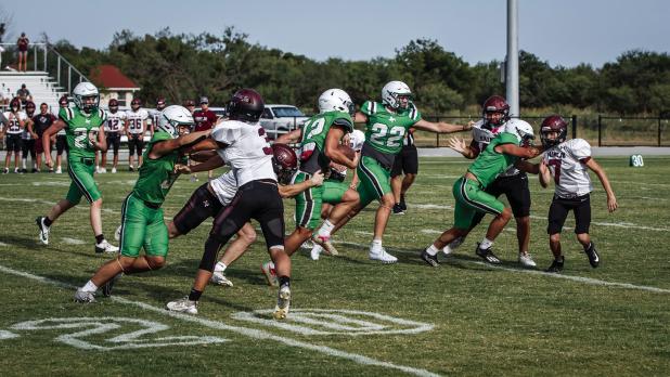 The Bobcats have a strong running game this season with great blocking that will help the team go deep in the playoffs this season. Photo by Will Sadler