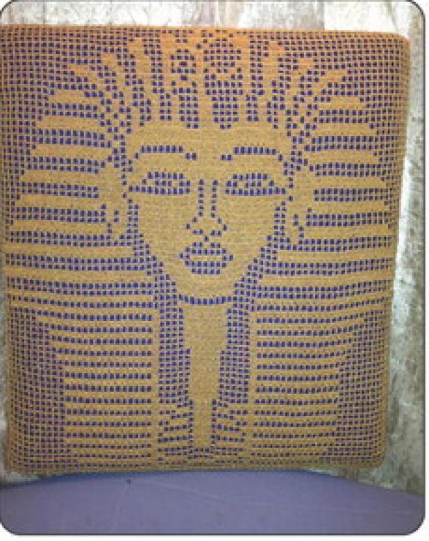 Crochet wall hanging of King Tut’s Death Mask. Photo by Susan Jeske