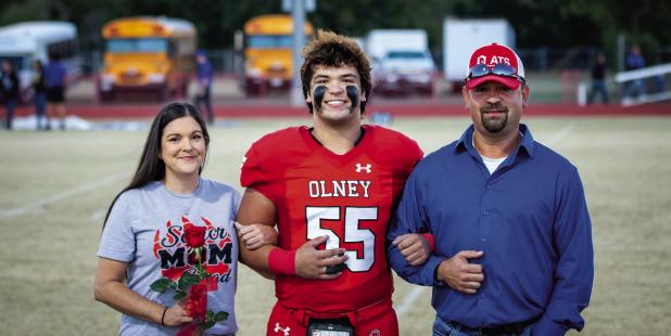 OHS Cub #55 Jordan Jacoba was escorted by Michael and Angela Jacoba. Jordan played left guard and defensive tackle for 4 years for the Cubs.