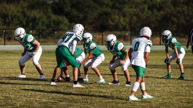 The Bobcats played hard but could not contain the defense of the May Tigers. Photo by Will Sadler OJH Cheerleaders were on hand to perform cheers and dance routines to help keep the hometown crowd’s spirits pumped up. Photo by Will Sadler