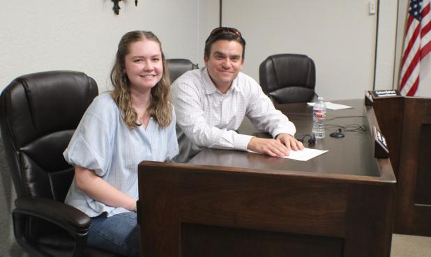 Adelade Edgington (L), a rising senior at Texas A&M University and OHS graduate, attended the June 8 City Council meeting with City Attorney Dan Branum (R). Ms. Edgington is considering attending law school after her college graduation next year. Phot