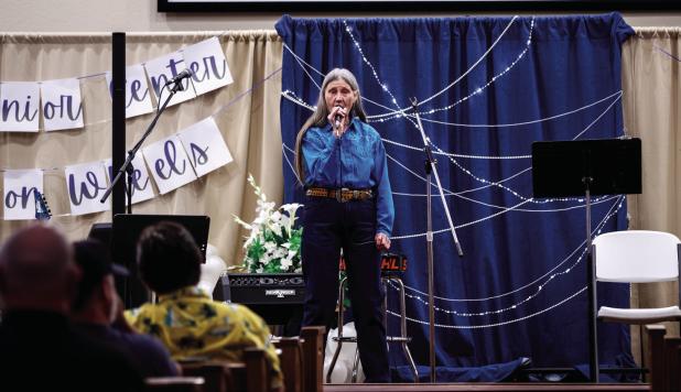 Sandy York, a beloved cashier at Stewart’s Food Store, amazed the Variety Show attendees with her sultry voice and had the crowd clapping and singing along to her country repetoire. Photo by Will Sadler