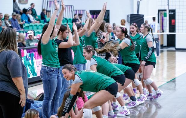 The NHS Ladycats getting pumped up before taking the court against their district rivals, the Garner Lady Longhorns.