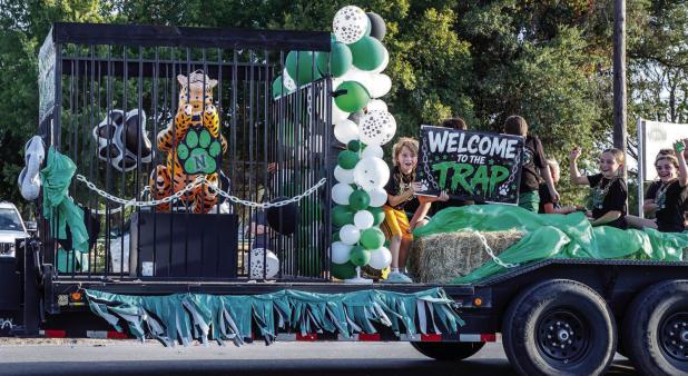 Young Ladycats and Bobcats caged the Guthrie Jaguar as part of their float for the 2026 Homecoming Parade on Wednesday, Sept. 2. The Bobcat football team battled the Guthrie Jaguars for their Homecoming game on Sept 4. | Photo by Will Sadler