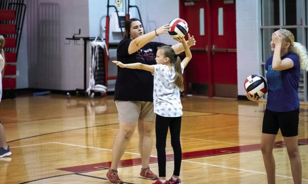 New volleyball coaches hold