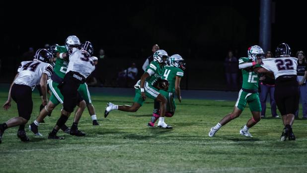 Bobcat #0 London Martinez had many breakaway scrambles against the Vernon Indians, helping secure a 46-8 blowout for the night. Photo by Will Sadler