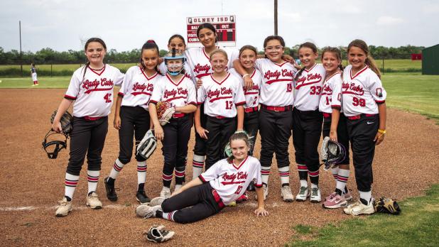 The third- and fourth-grade Lady Cubs hosted the Graham Lady Heat for summer bragging rights in softball, and the Lady Cubs came away with the win. Photo by Will Sadler