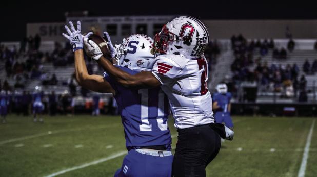 Cub receiver #2 Jamarcus Collins saves an interception with a heads up scramble to keep the Bulldog from picking the pass intended for Collins. Photo by Will Sadler