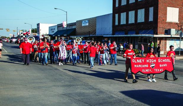The Pride of Olney High School Marching Band led the way in the Oct.3 Homecoming parade down Main Street. Photo by Will Sadler