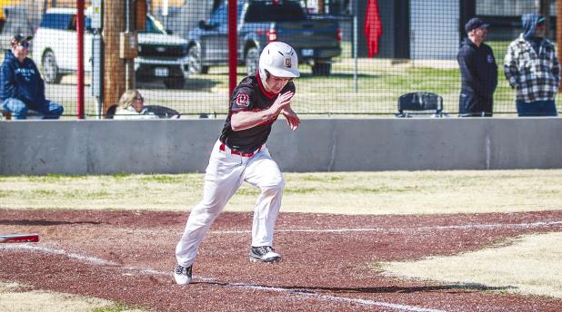 OHS Cub Maddox Johnson hits against the Santo pitcher. Johnson will be the Cubs center field starter this season. Photo by Will Sadler
