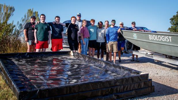 Pictured are the OHS Ag class, Tom Parker, Executive Director of the Olney Economic Development Corporation, and Wes Dutter and his team of volunteers from the Texas Parks & Wildlife.
