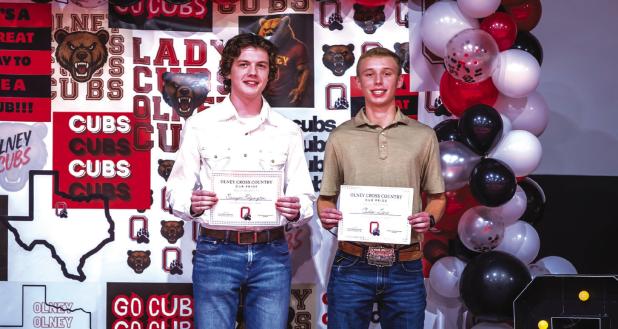 A pair of OHS Cubs received the Cub Pride Award for Cross Country, Sawyer Edgington [L] and Caden Lane [R]. Photo by Will Sadler