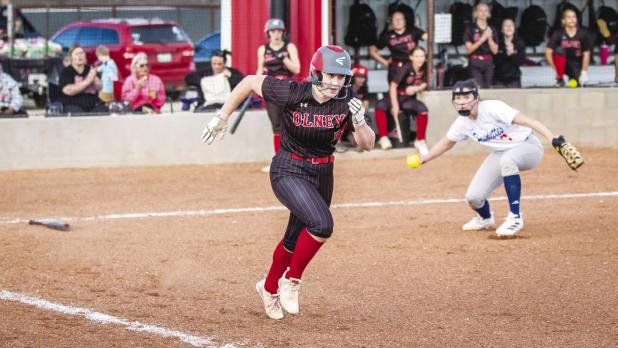 OHS Lady Cub #5 Morgan Simmons scrambles for first base after a hit against Knox City. Photo by Will Sadler