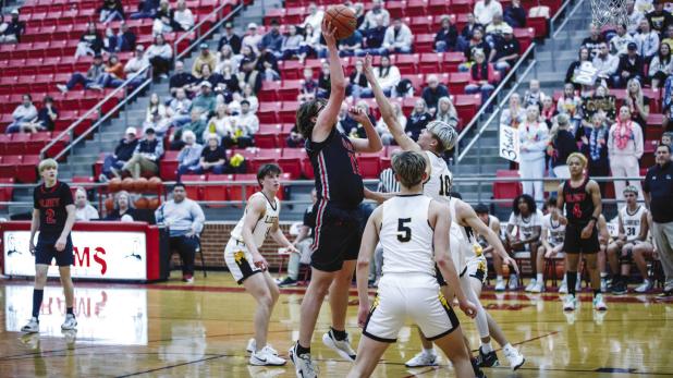 OHS Cubs #15 Luke Lane sank 3 free throws and was a force to be reckoned with under the basket. Photo by Will Sadler