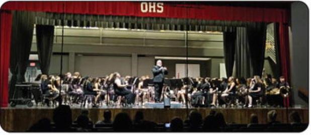 The OHS band performs at the campus auditorium on May 6. The band played “Along the River’s Shore” by James Swearingen, “Ye Banks and Braes O’Bonnie Doon” by Percy Aldridge Grainger; and a medley from “West Side Story” by Leonard Bernstein