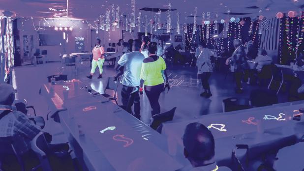 Attendees for the Young County Olney Senior Cub Center [Cub Center] danced the night away under black lights during a recent ‘80s themed dance party hosted by the Cub Center. Photo by Will Sadler