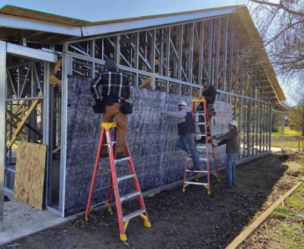 The OEDC seeks $6.1 million in USDA grants to build a modular home component manufacturing operation in Olney. The plant would be operated by Steve Bezner and Terry Horton, who tested components at this home on West Oak Street last year. Photo by Gina Kea