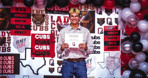 Football player Tucker Cortinez received the Offensive MVP Award. Photo by Will Sadler