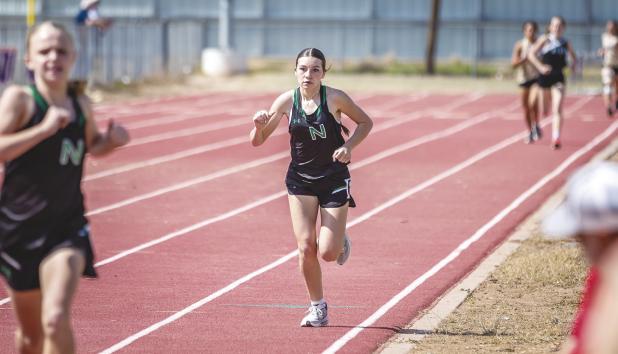 NHS Ladycat Greenleigh Moore moves on to Regionals in the 1600m and 3200m run. Photo by Will Sadler