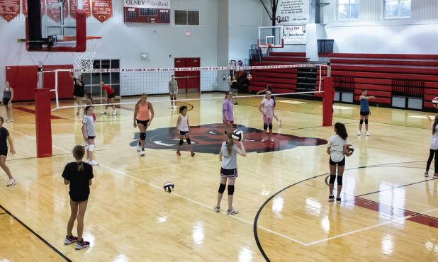 New volleyball coaches hold