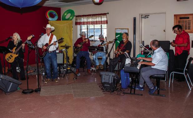 The Survivors had the Cub Center attendees of the summer dance boot-scootin’ across the dance floor. Cub Center Activity Director Cany Blair wished to express a big thank you to the band and the bands director/sound manager Wayne Widner. Photo by Will S