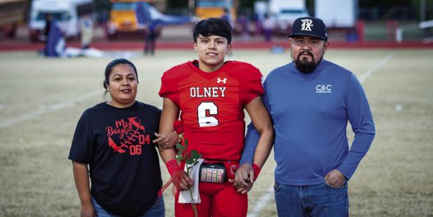 OHS Cub #6 Jacob Hernandez was escorted by Christian and Maribel Hernandez. Jacob played quarterback and safety for 4 years with the Cubs. Jacob plans to attend MSU to earn a degree in finance. His favorite memory is being a part of the Cubs run to the Bi-District Championship and winning. 