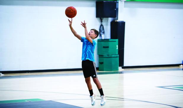 By the smiles and laughter, it looked like shooting the ball was everyone’s favorite part of summer basketball camp. Photo by Will Sadler