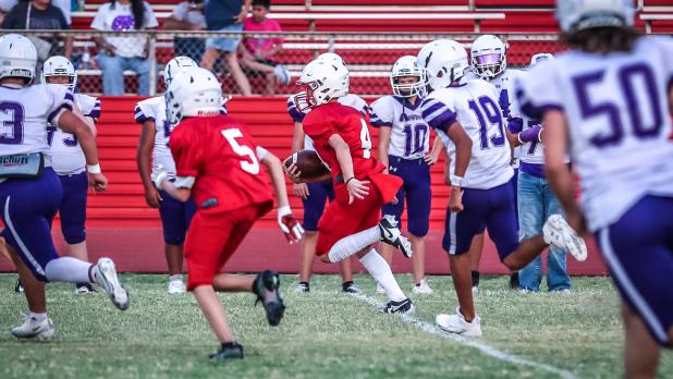 OJH Cub #4 Rylan Keeter breezed through Plowboys defensive players with the speed of a cheetah. Photo by Will Sadler